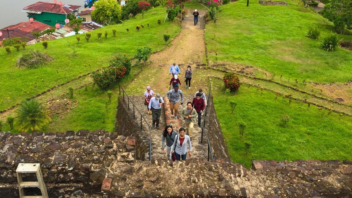 Student hiking in ancient ruins